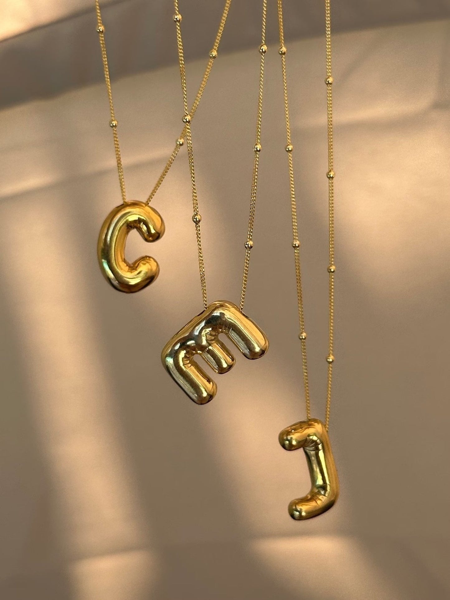 Ballon™ alfabet hanger '18k verguld'